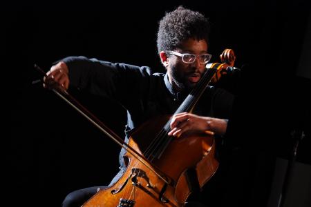 Seth Parker Woods playing cello