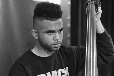 Nick Dunston playing upright bass
