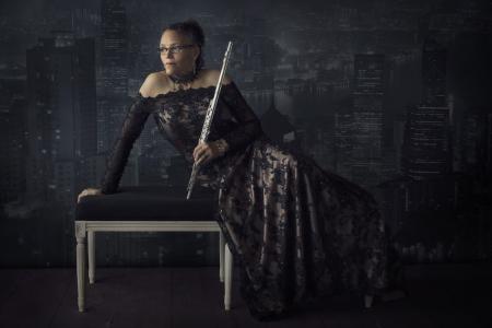 Nicole Mitchell posed with a flute