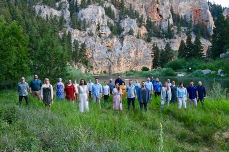 Members of The Crossing posing in a natural setting