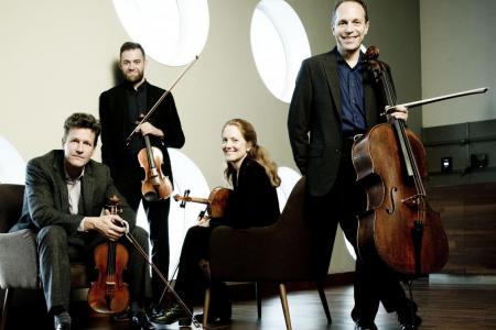 St. Lawrence String Quartet posing with instruments