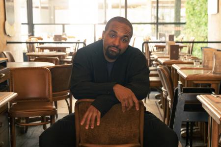 Sullivan Fortner seated press photo