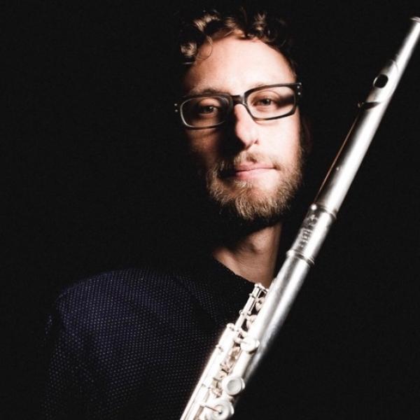 Tim Munro holding flute