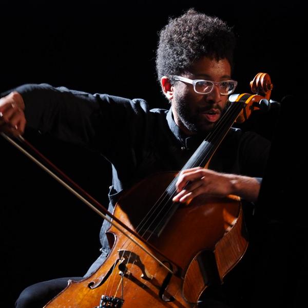 Seth Parker Woods playing cello