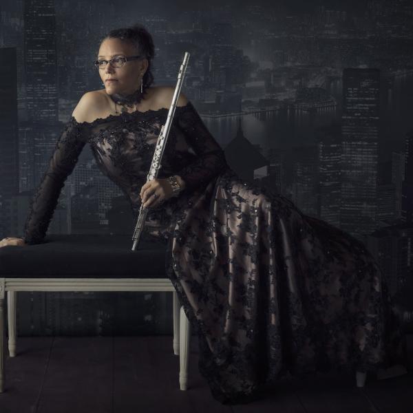 Nicole Mitchell posed with a flute