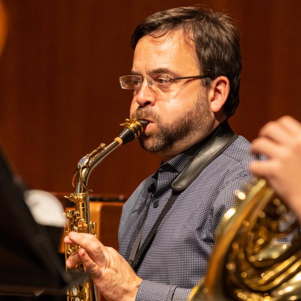 Grossman Ensemble members playing woodwind instruments