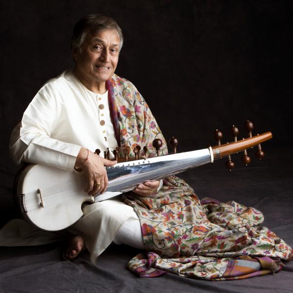Amjad Ali Khan posing with a sarod