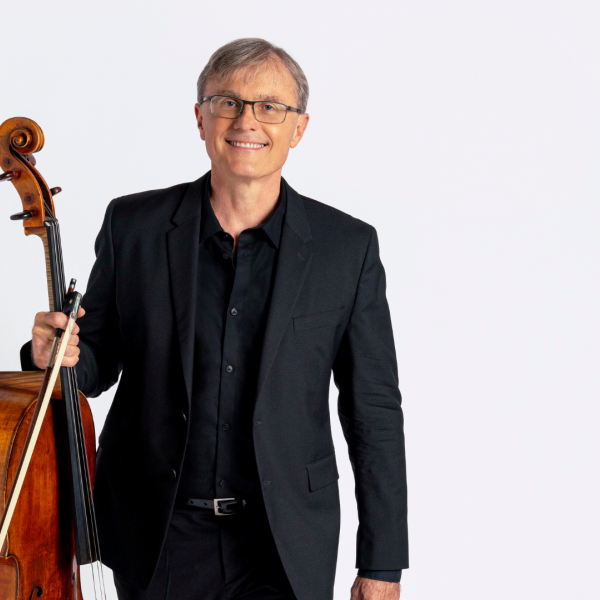 John Sharp poses with his cello.