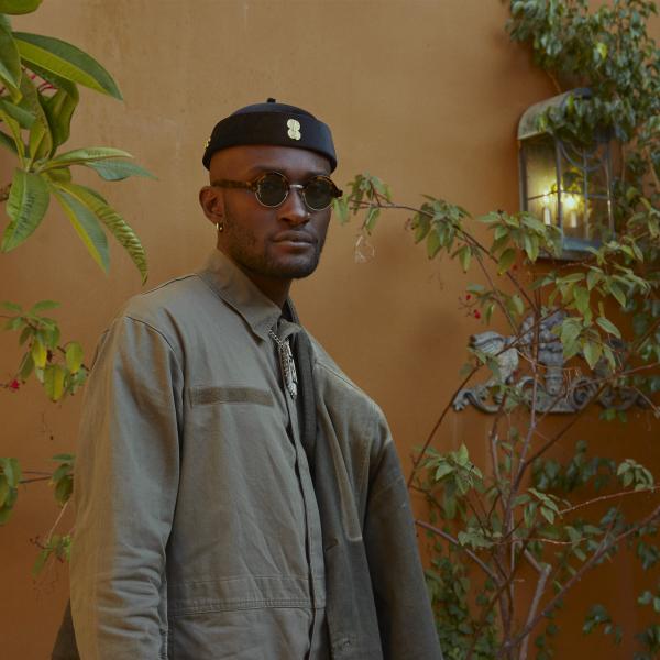  Isaiah Collier against a yellow wall