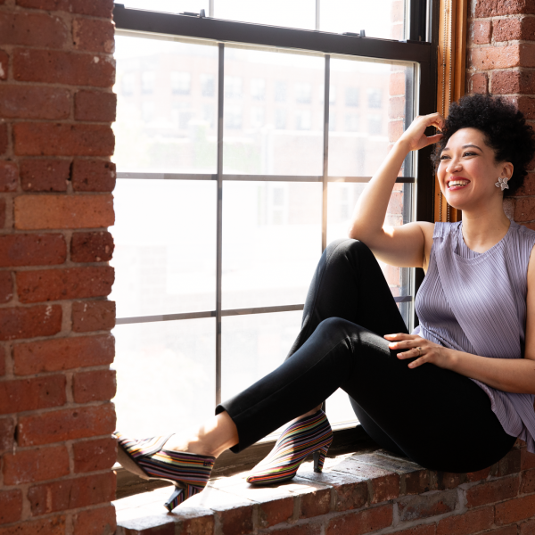 Julia Bullock sitting by the window